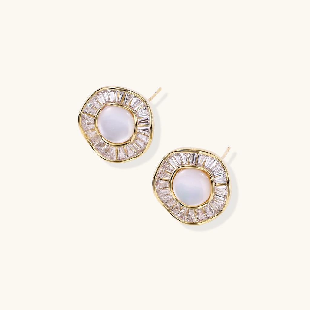 Gold-plated stud earrings with central freshwater pearl surrounded by baguette crystals in radial pattern