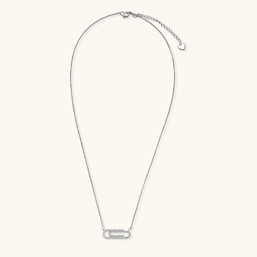 Delicate 14K gold plated chain necklace with crystal-accented carabiner-style pendant on white background