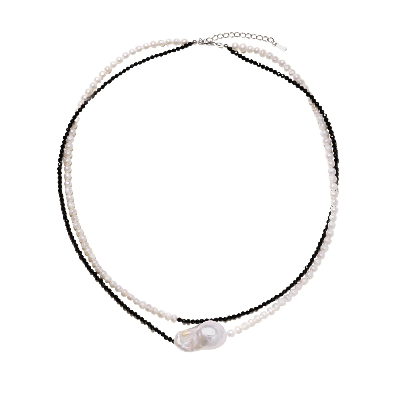 Double-strand necklace with black faceted quartz and white pearls featuring an oversized baroque pearl centerpiece