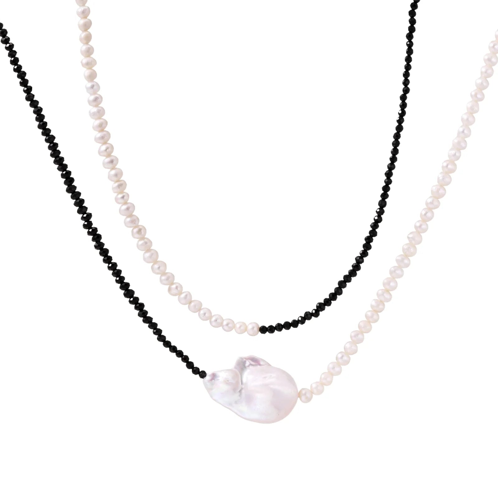 Double-strand necklace with black faceted quartz and white pearls featuring an oversized baroque pearl centerpiece