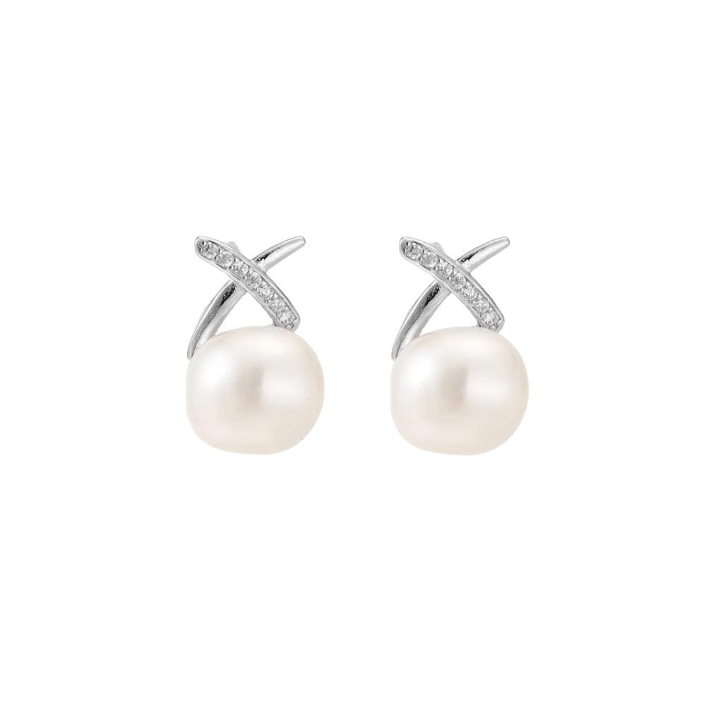 Rhodium-plated silver stud earrings with sparkling X design above lustrous round freshwater pearls on white background.