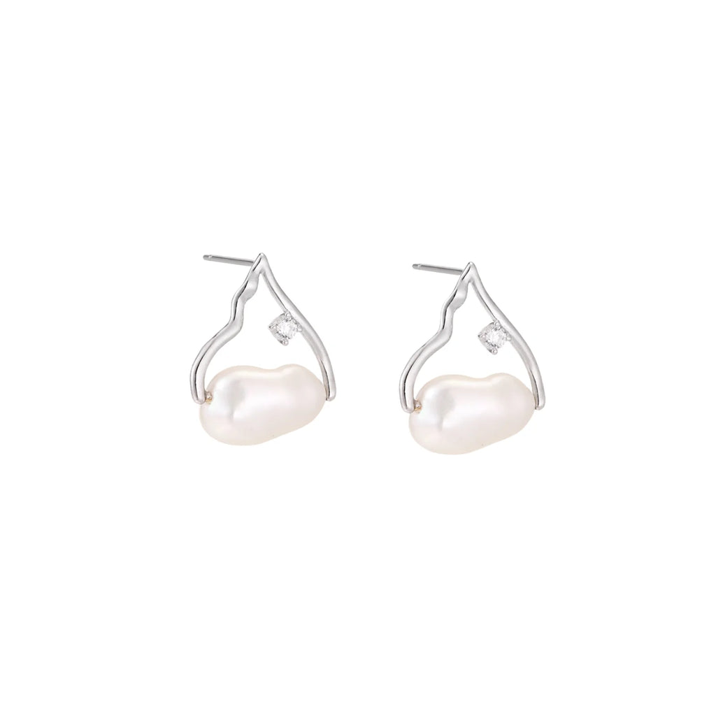 Silver mountain outline studs with baroque pearl and diamond accent on white background