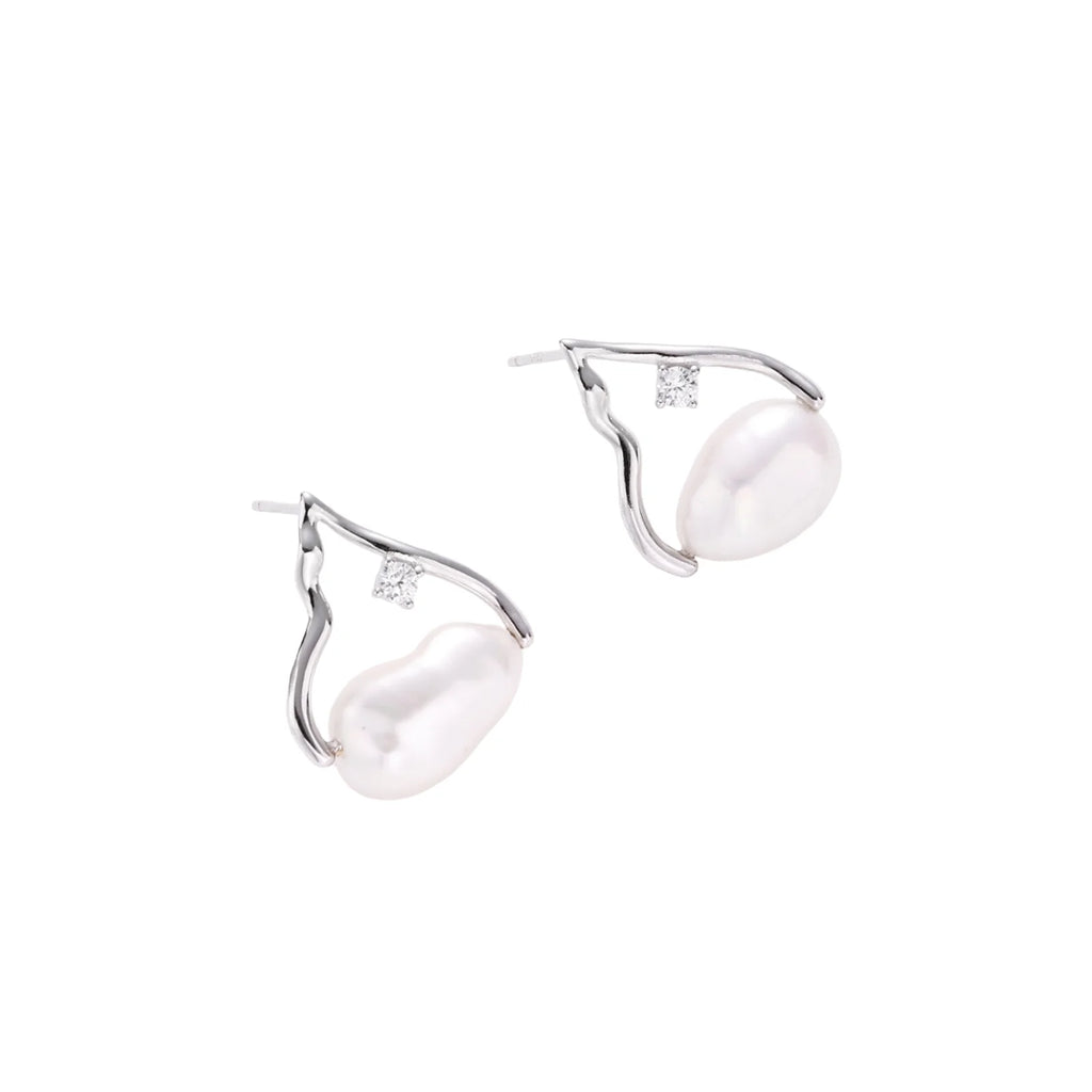 Silver mountain outline studs with baroque pearl and diamond accent on white background