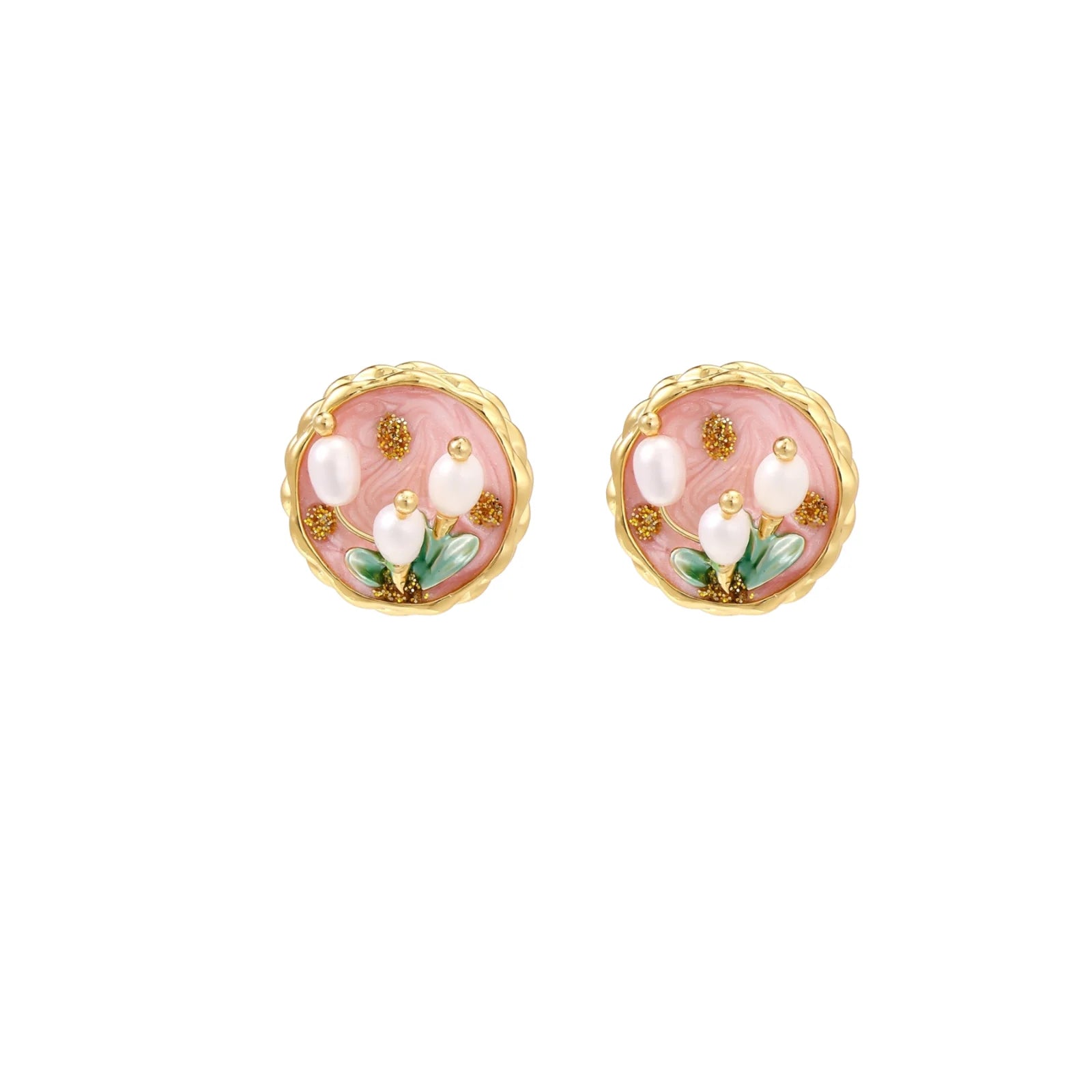 Round stud earrings with pink enamel, three white freshwater pearls, green leaves, and gold-plated braided border